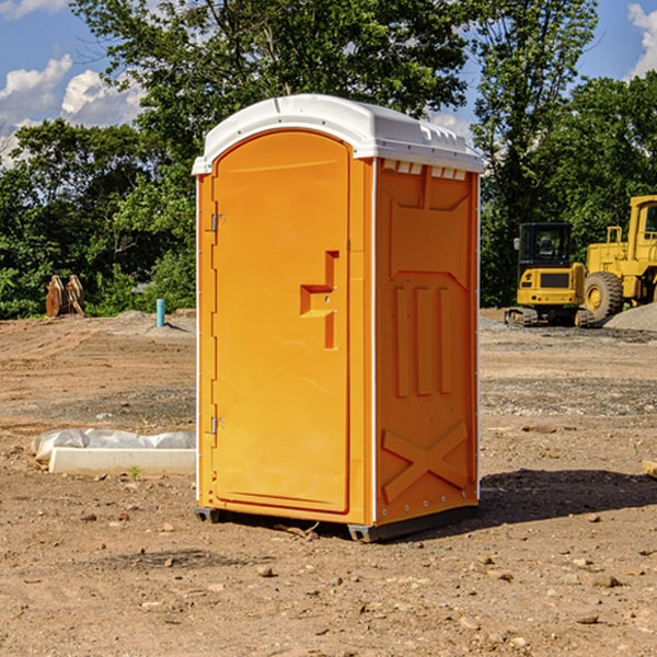 what is the cost difference between standard and deluxe portable restroom rentals in Grant